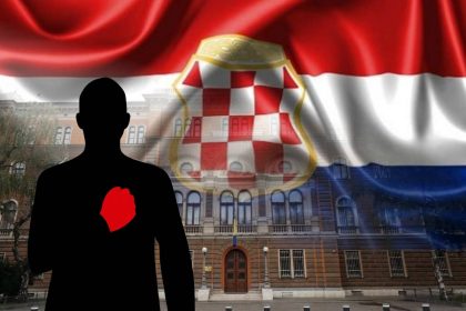 Silueta muškarca s crvenom šakom na srcu ispred zgrade Predsjedništva BiH, s hrvatskom trobojnicom i grbom Herceg-Bosne iznad.