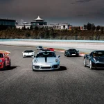 Automobili Porsche na testnoj pisti.