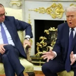 Njemački kancelar Merz u razgovoru s američkim predsjednikom Trumpom.